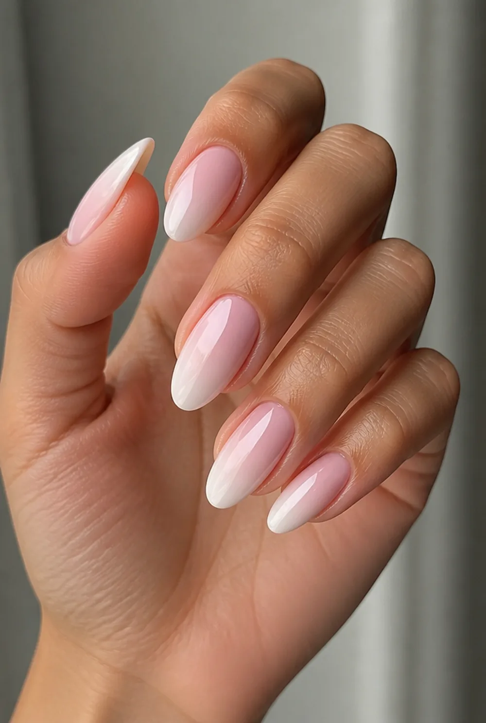 oval ombre nail art on olive skin, long length