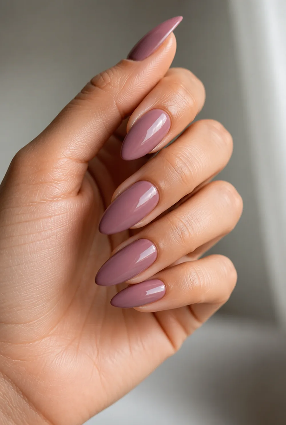 mauve pink nail art on olive skin, long length
