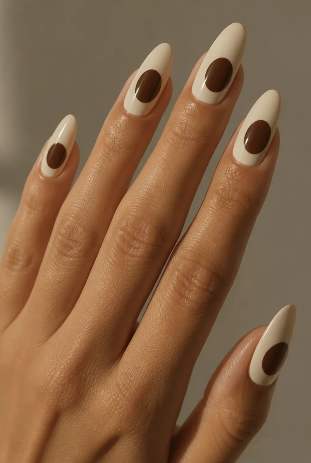 large single dot nail art on olive skin, long length