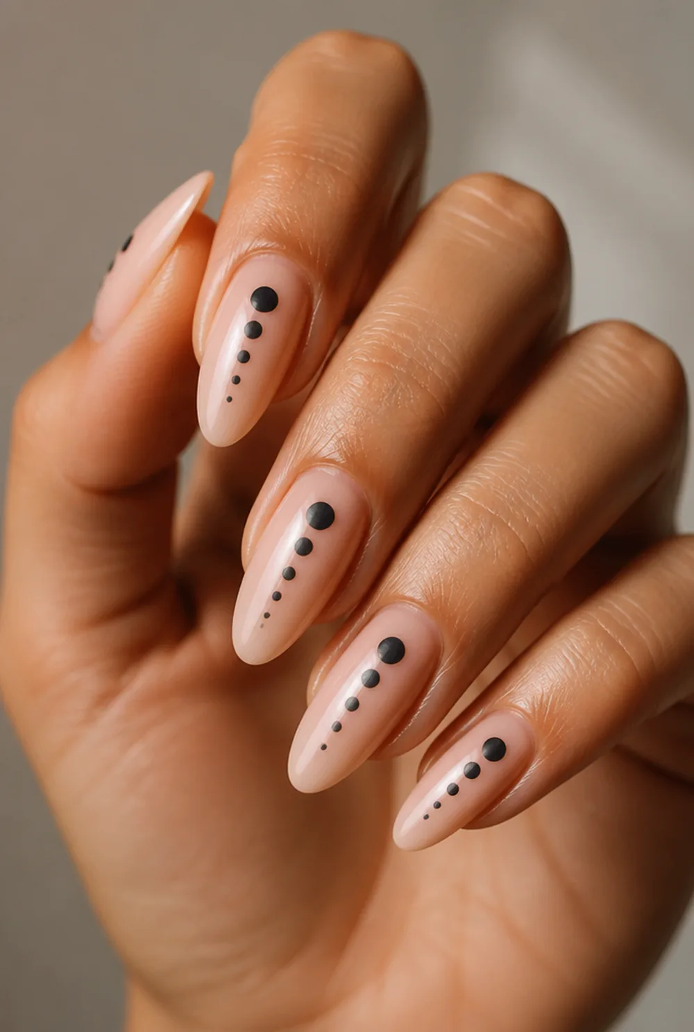 graduated dots nail art on olive skin, long length