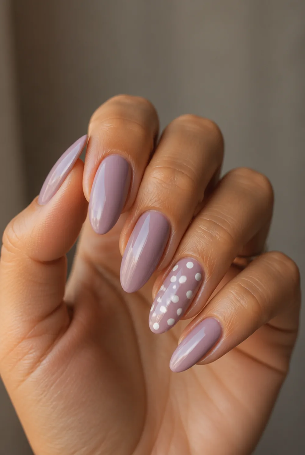dots on one accent nail nail art on olive skin, long length