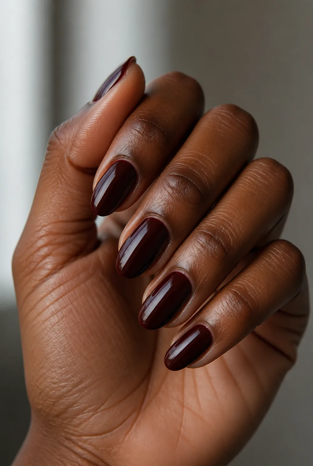 blackened cherry almond nail art on deep brown skin - PolishedAndPrettyNails.com blackened cherry almond nail art on deep brown skin