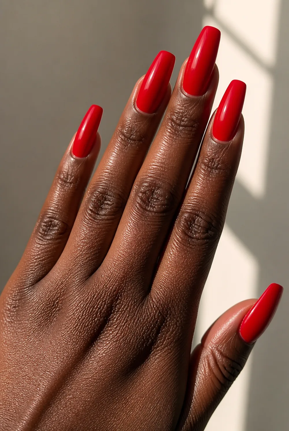 red coffin long nail art on deep brown skin - PolishedAndPrettyNails.com red coffin long nail art on deep brown skin