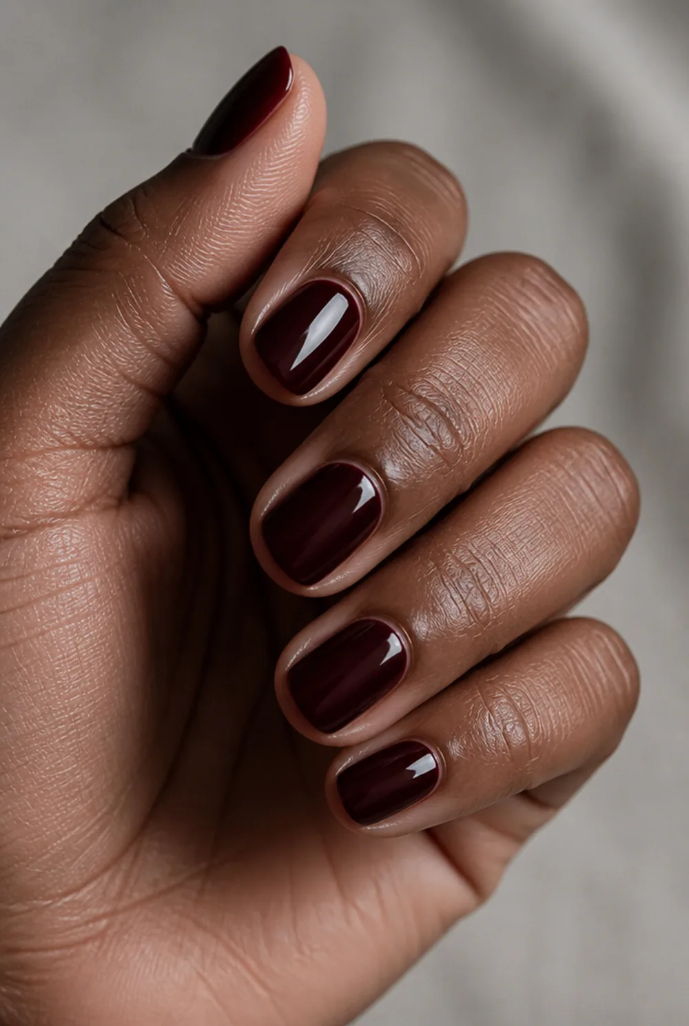 blackened cherry nail art on deep brown skin - PolishedAndPrettyNails.com blackened cherry nail art on deep brown skin