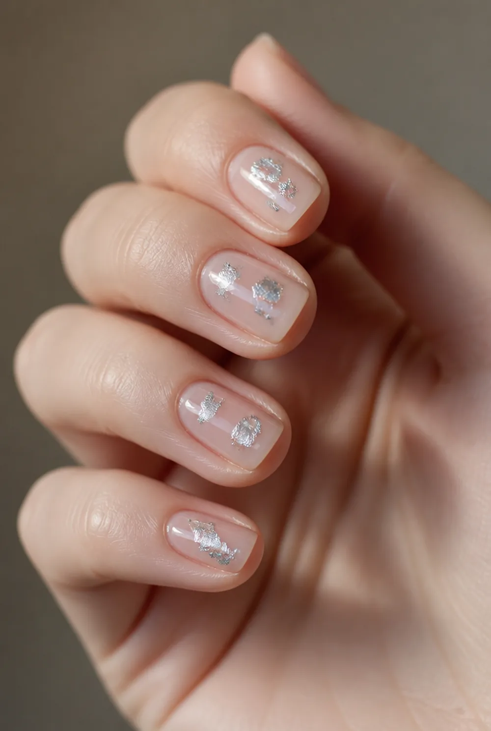 silver foil shards nail art on fair skin short length - PolishedAndPrettyNails.com silver foil shards nail art on fair skin, short length