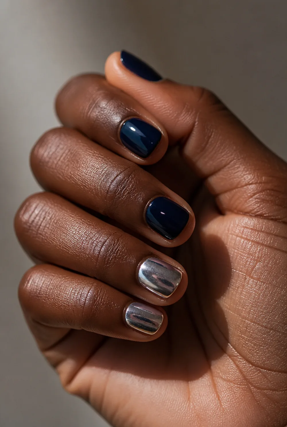 silver on navy nail art on deep brown skin - PolishedAndPrettyNails.com silver on navy nail art on deep brown skin
