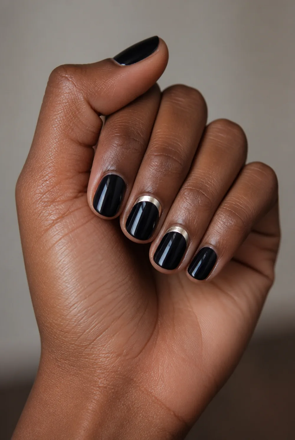 silver half moon nail art on deep brown skin - PolishedAndPrettyNails.com silver half moon nail art on deep brown skin