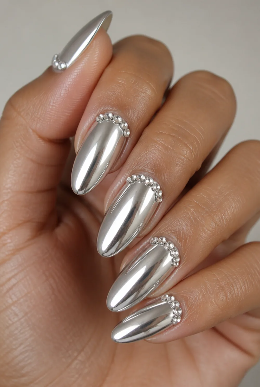 silver with rhinestone cuff nail art on olive skin long length - PolishedAndPrettyNails.com silver with rhinestone cuff nail art on olive skin, long length