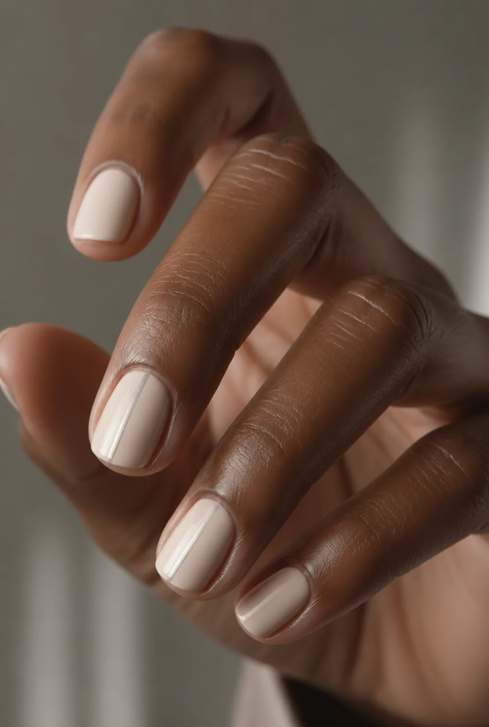 silver line on nude nail art on deep brown skin - PolishedAndPrettyNails.com silver line on nude nail art on deep brown skin