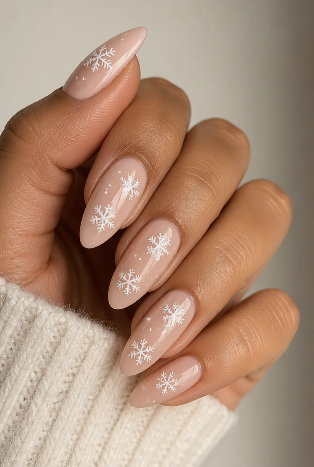 snowflake decals nail art on olive skin, long length
