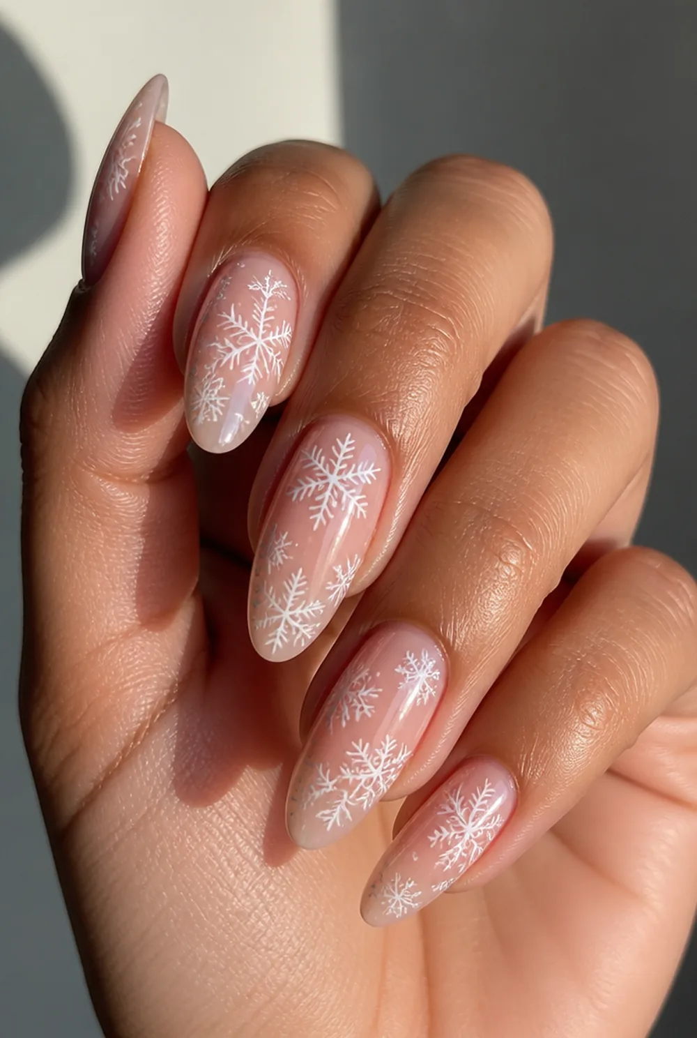 scattered micro flakes nail art on olive skin, long length