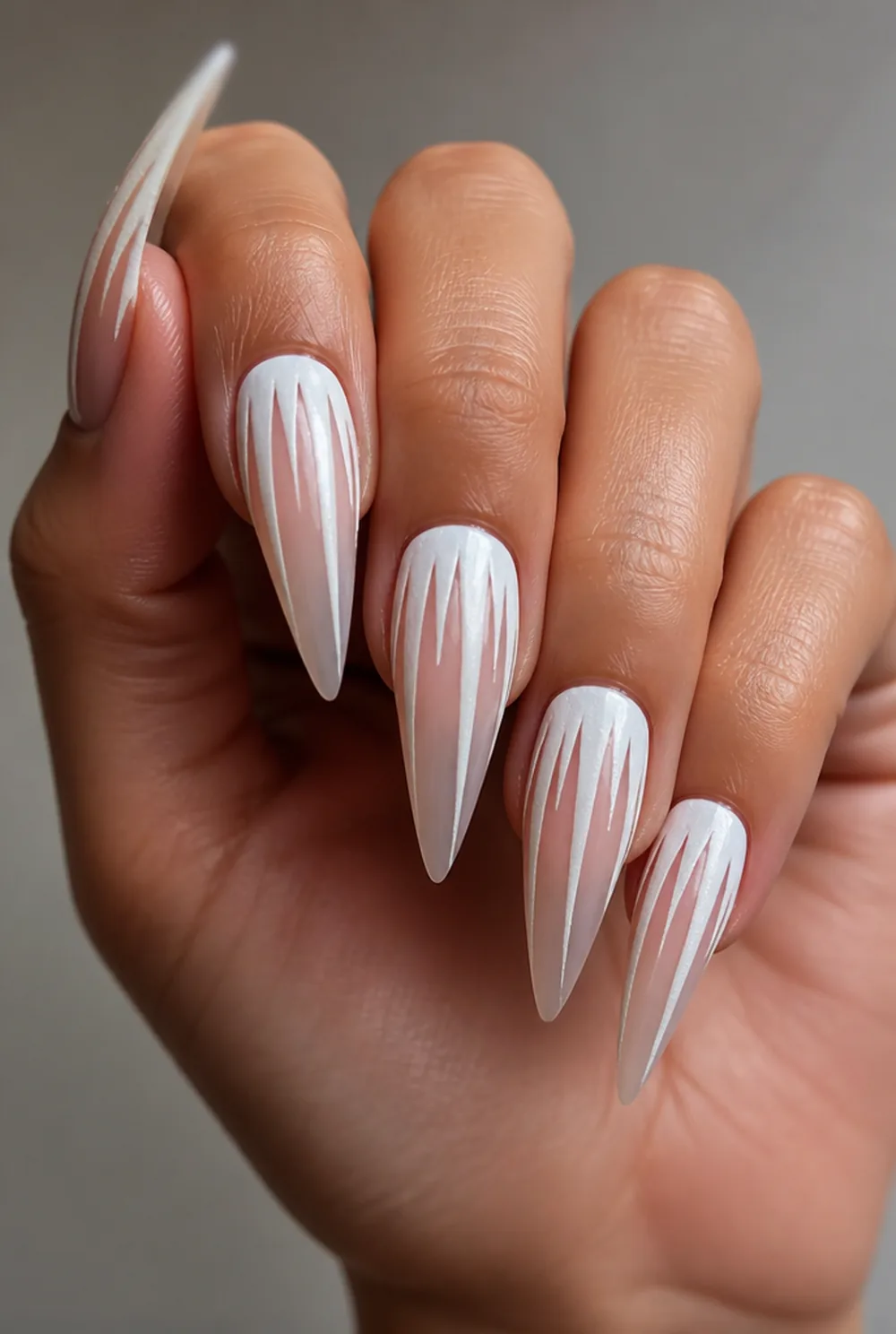 icicle tips nail art on olive skin, long length