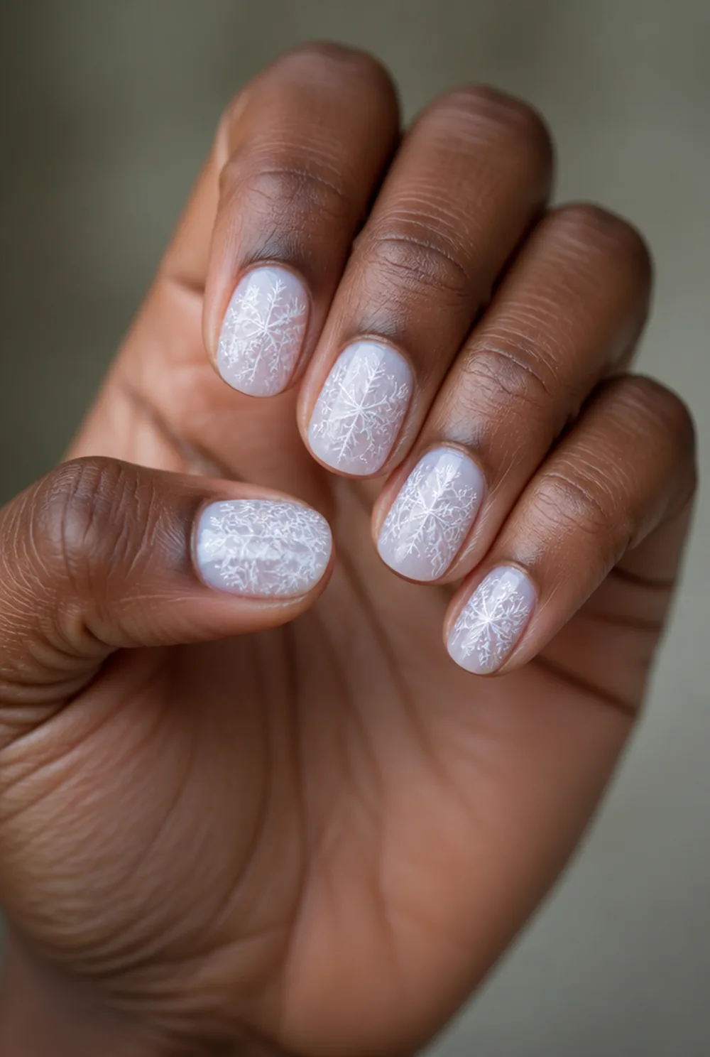 full frost set nail art on deep brown skin