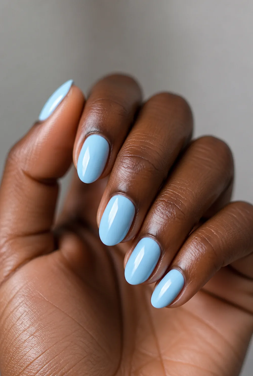 sky blue nail art on deep brown skin - PolishedAndPrettyNails.com sky blue nail art on deep brown skin