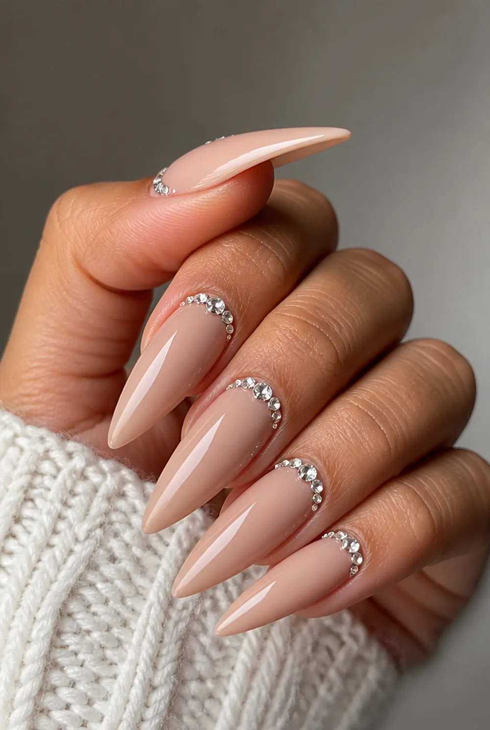 stiletto with rhinestone cuff nail art on olive skin, long length