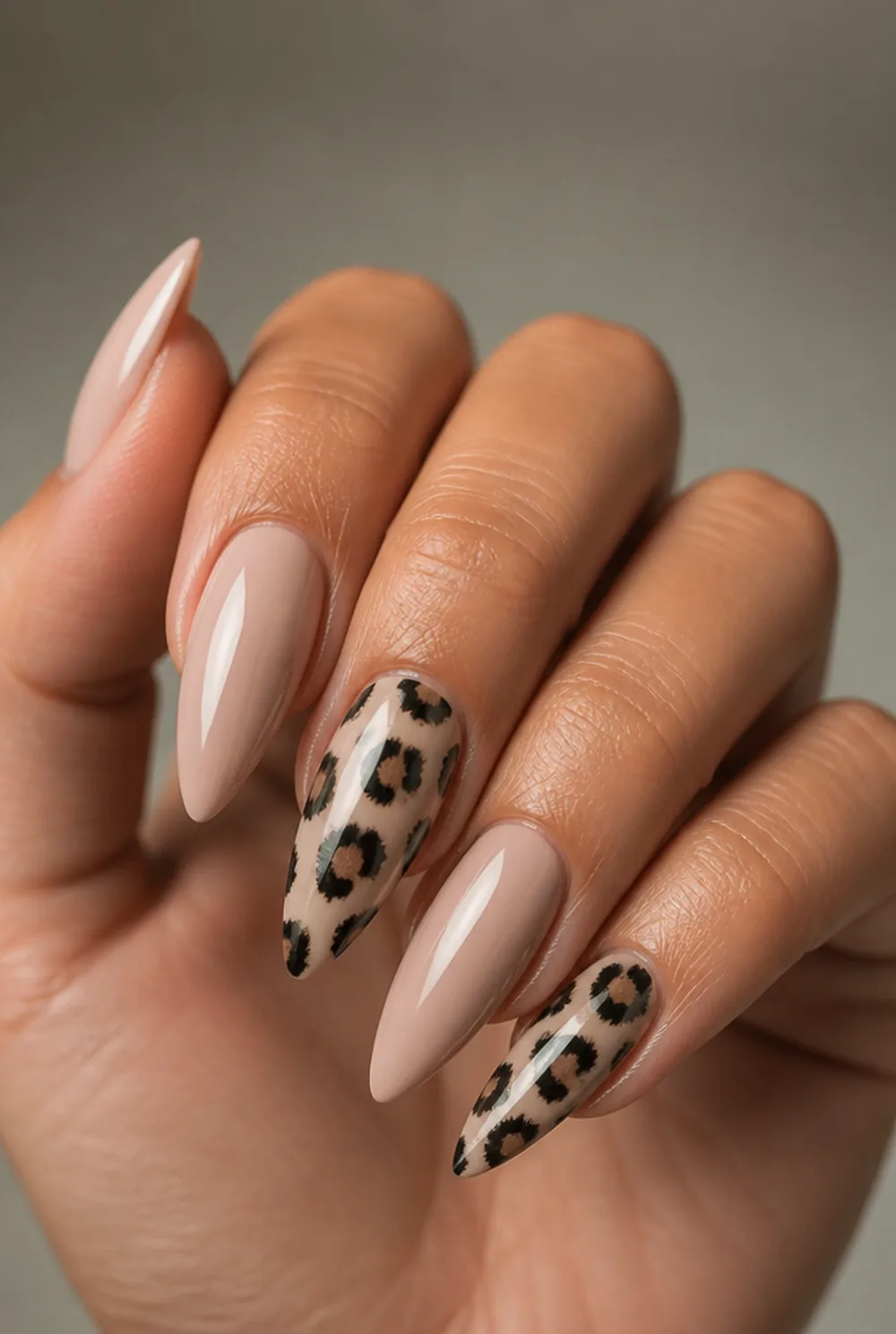 stiletto leopard accent nail art on olive skin, long length