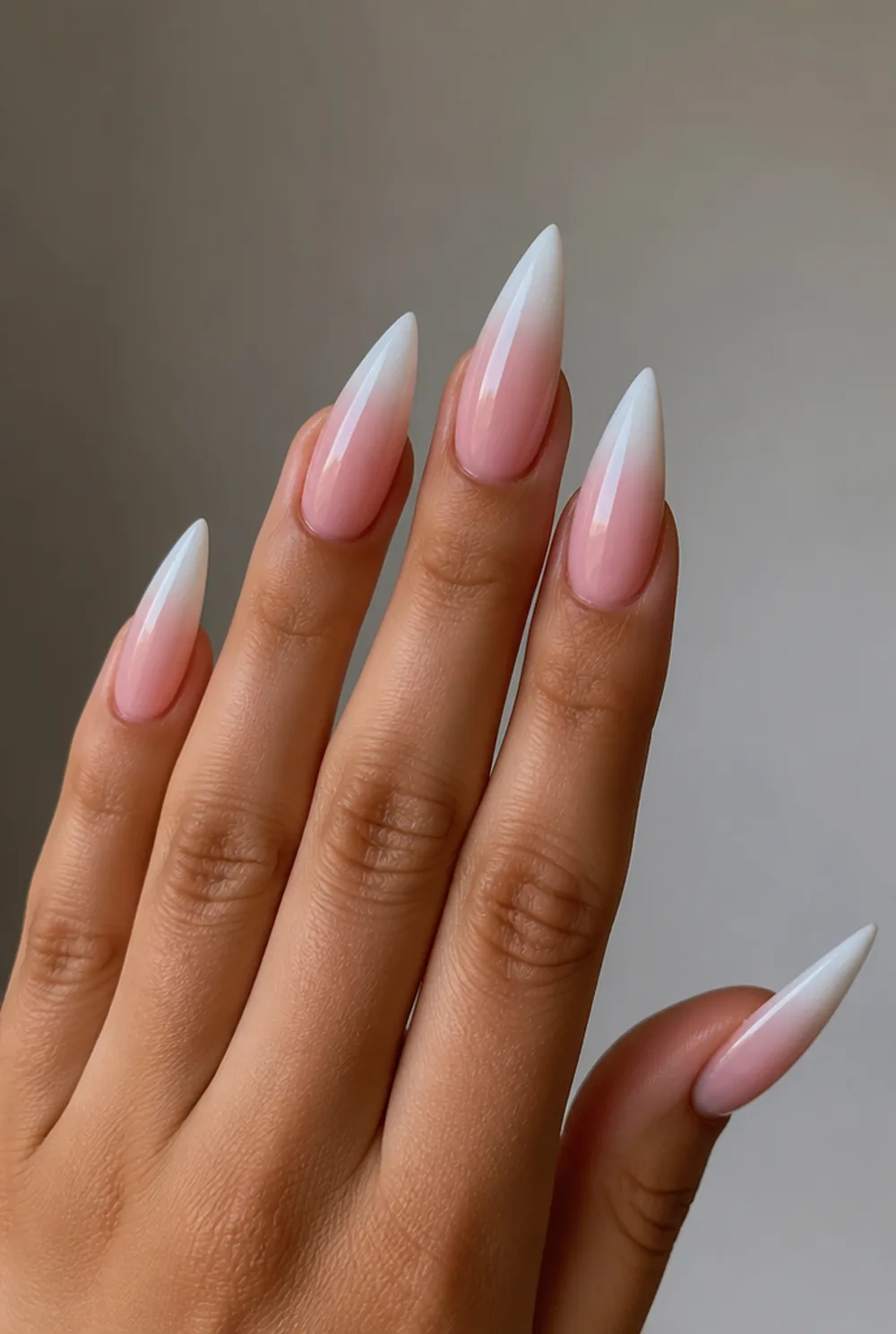 stiletto ombre nail art on olive skin, long length