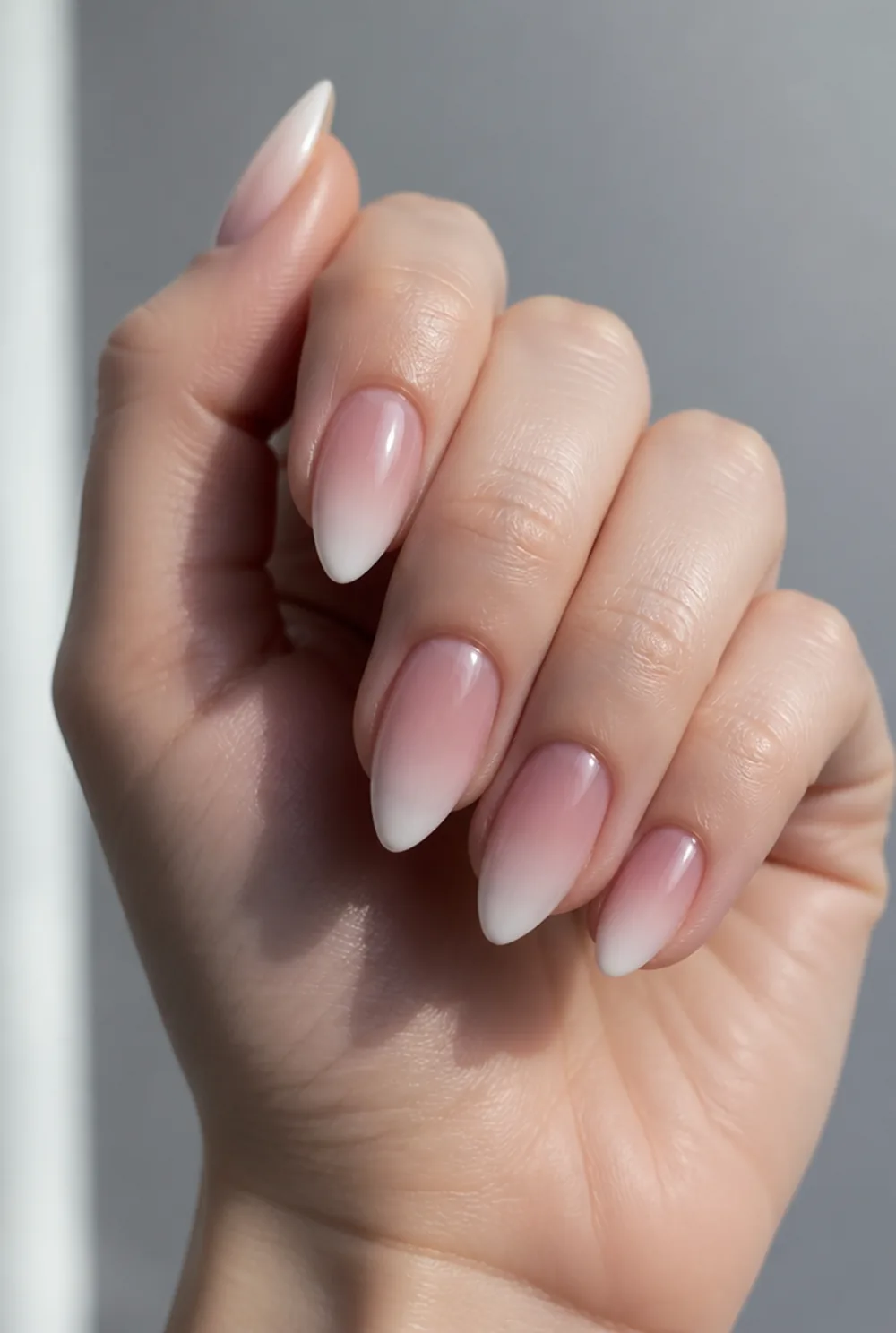 stiletto ombre nail art on fair skin, short length