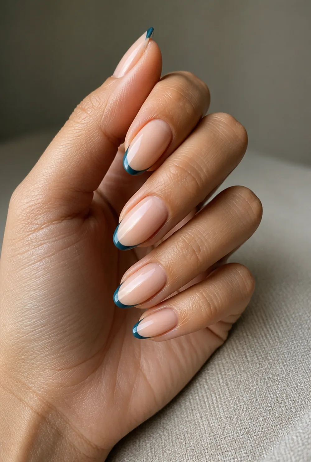teal micro french nail art on olive skin, long length