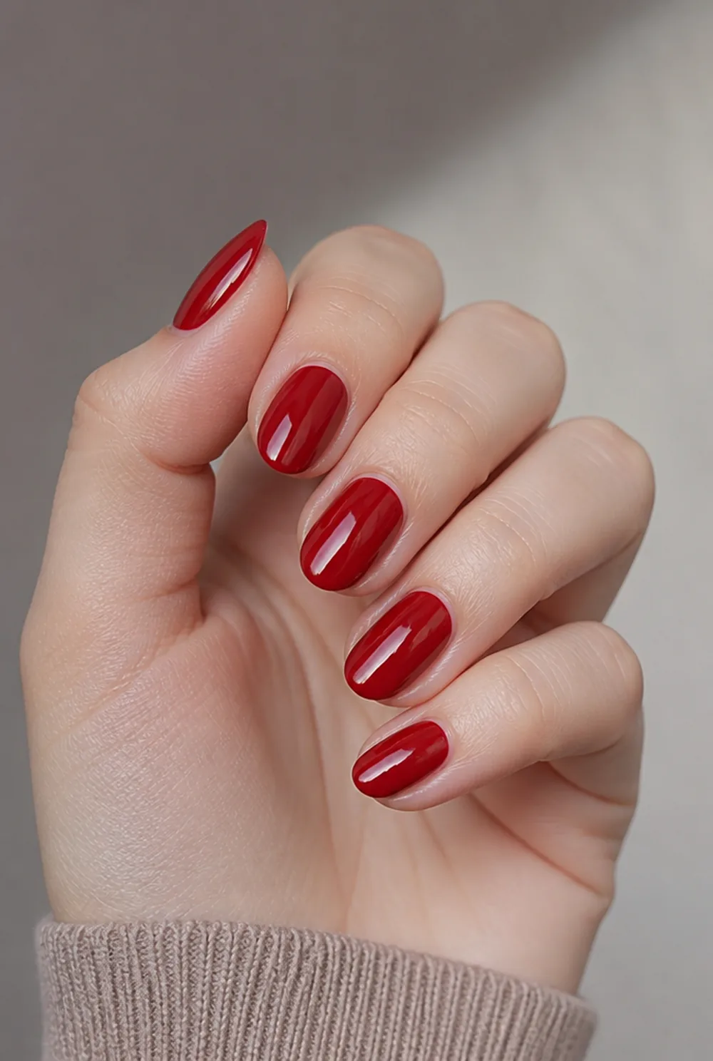 cherry red nail art on fair skin, short length