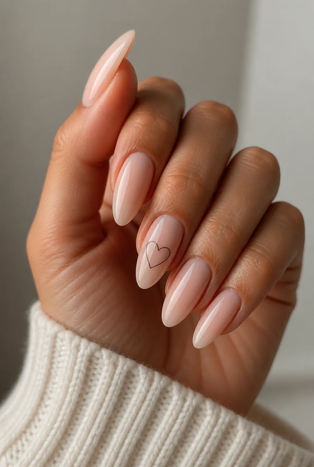 outline heart nail art on olive skin, long length