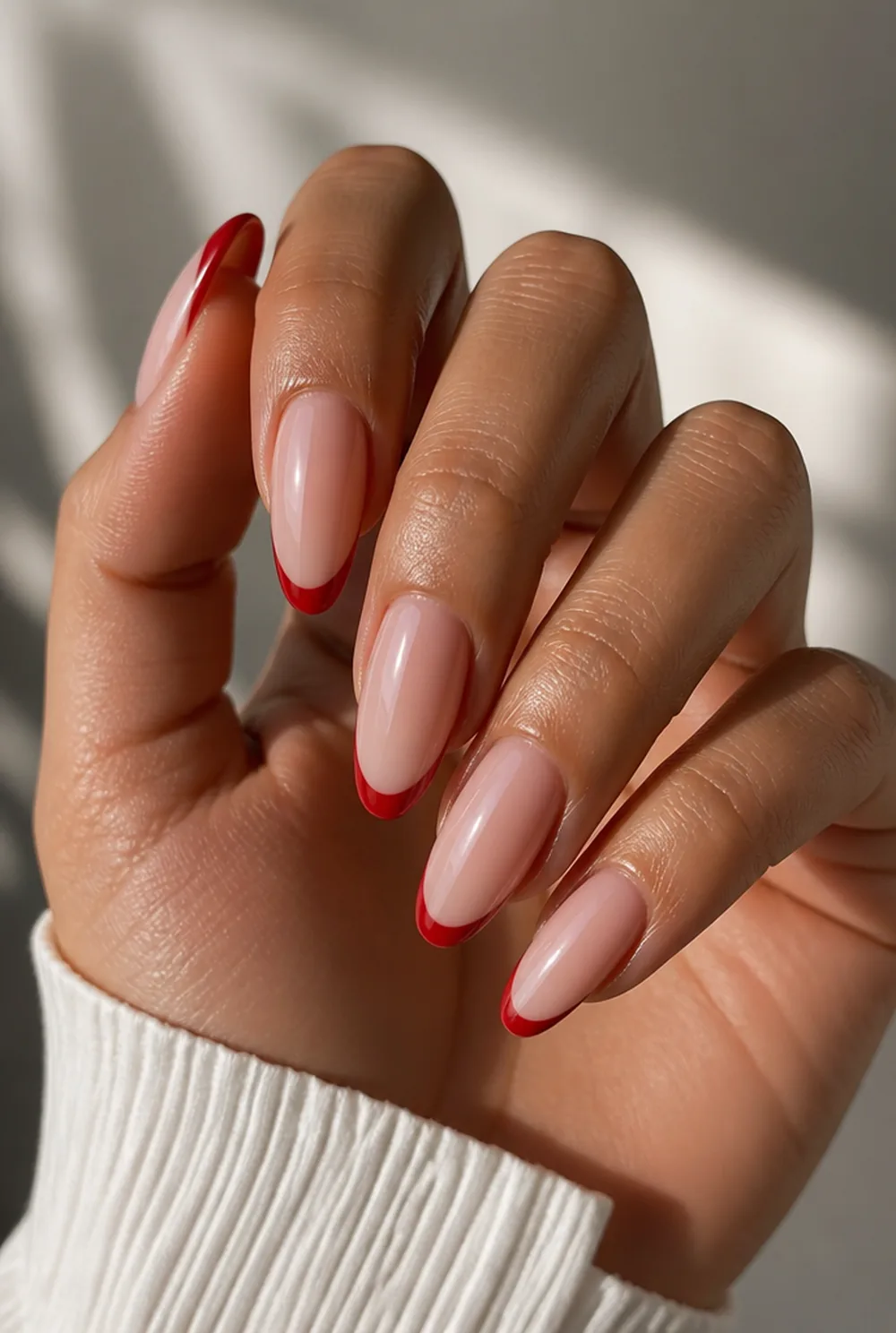 pink base, red tips nail art on olive skin, long length