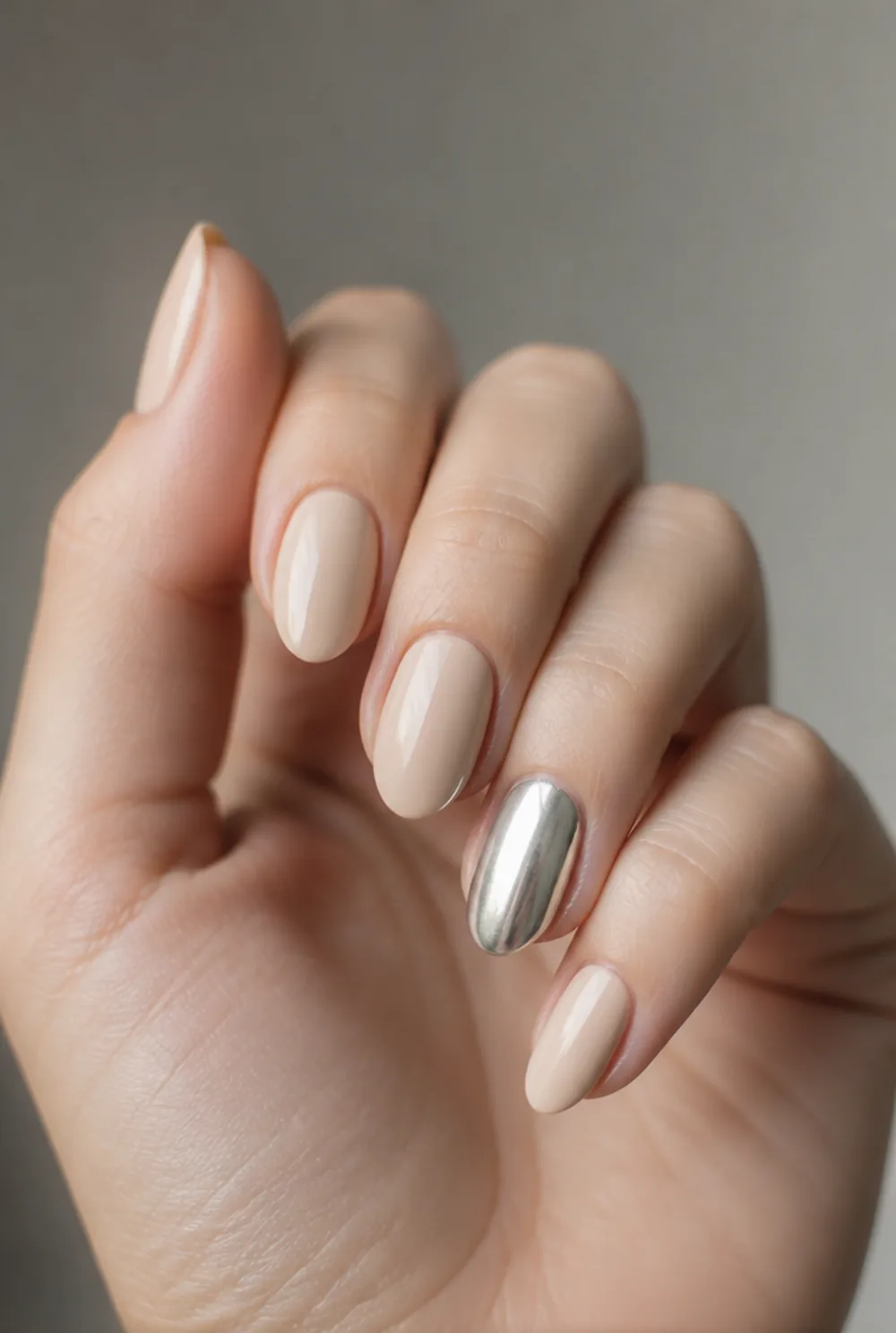 silver chrome accent nail art on fair skin short length - PolishedAndPrettyNails.com silver chrome accent nail art on fair skin, short length