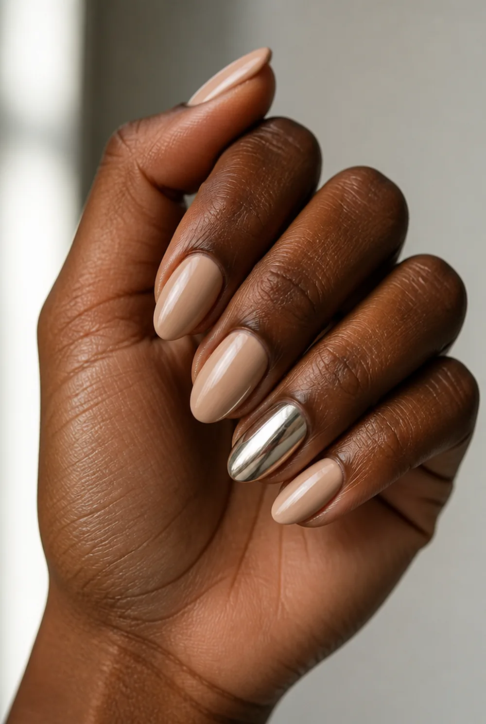 silver chrome accent nail art on deep brown skin - PolishedAndPrettyNails.com silver chrome accent nail art on deep brown skin
