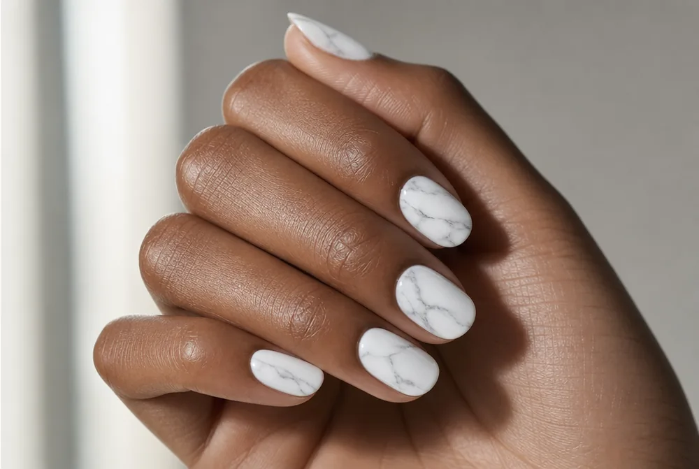 white Carrara marble nails with grey veining