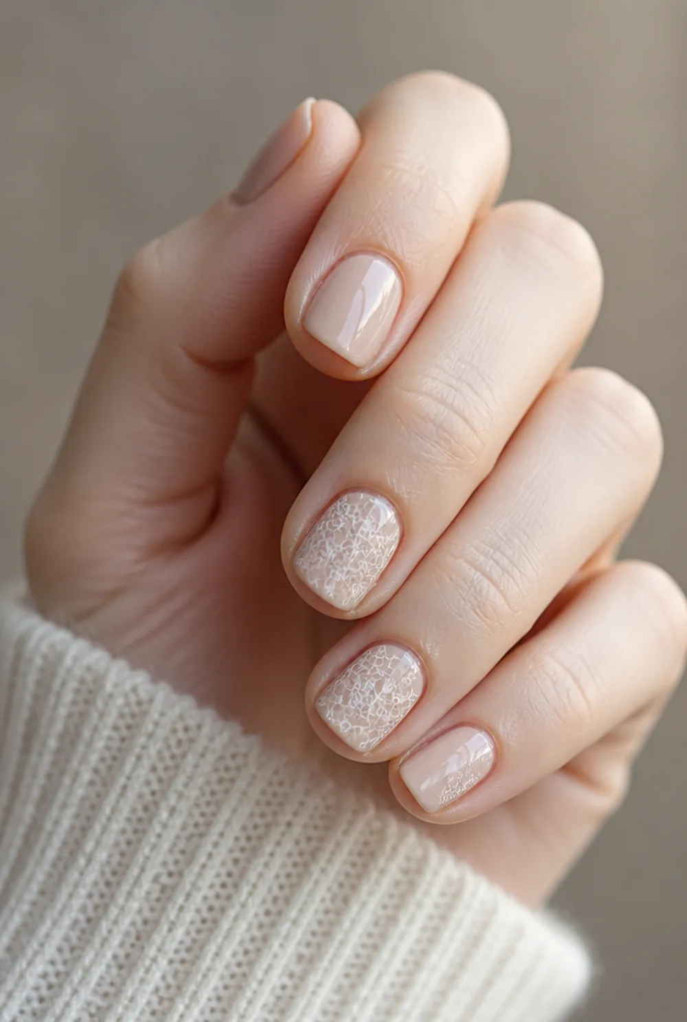 white lace nail art on fair skin, short length