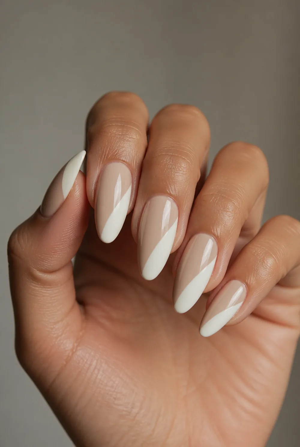 white and nude half and half nail art on olive skin, long length