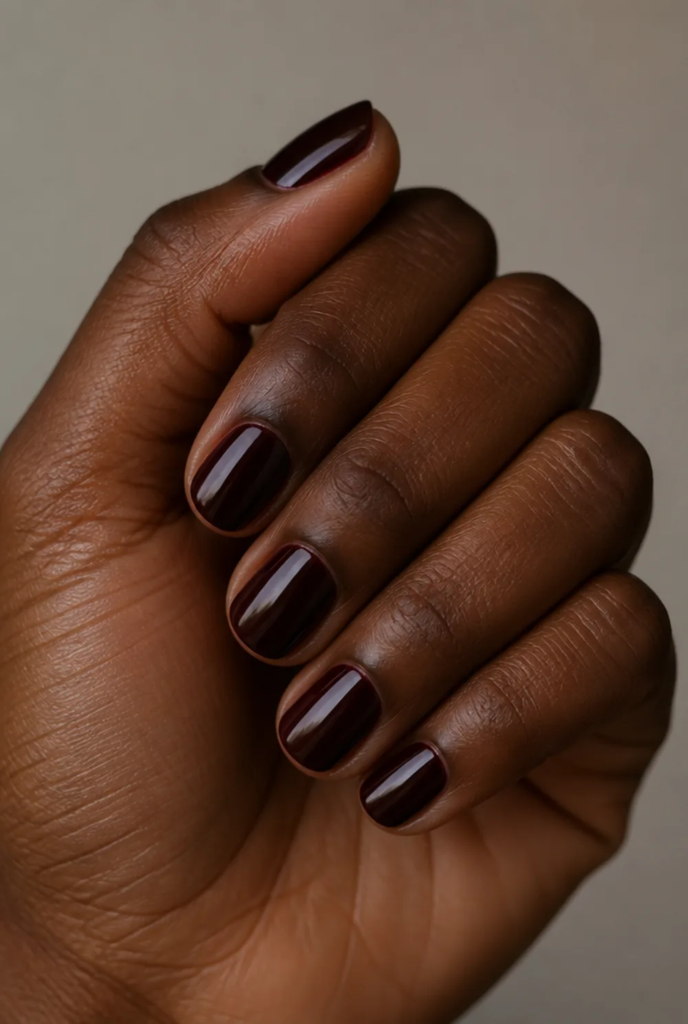 blackened cherry nail art on deep brown skin - PolishedAndPrettyNails.com blackened cherry nail art on deep brown skin