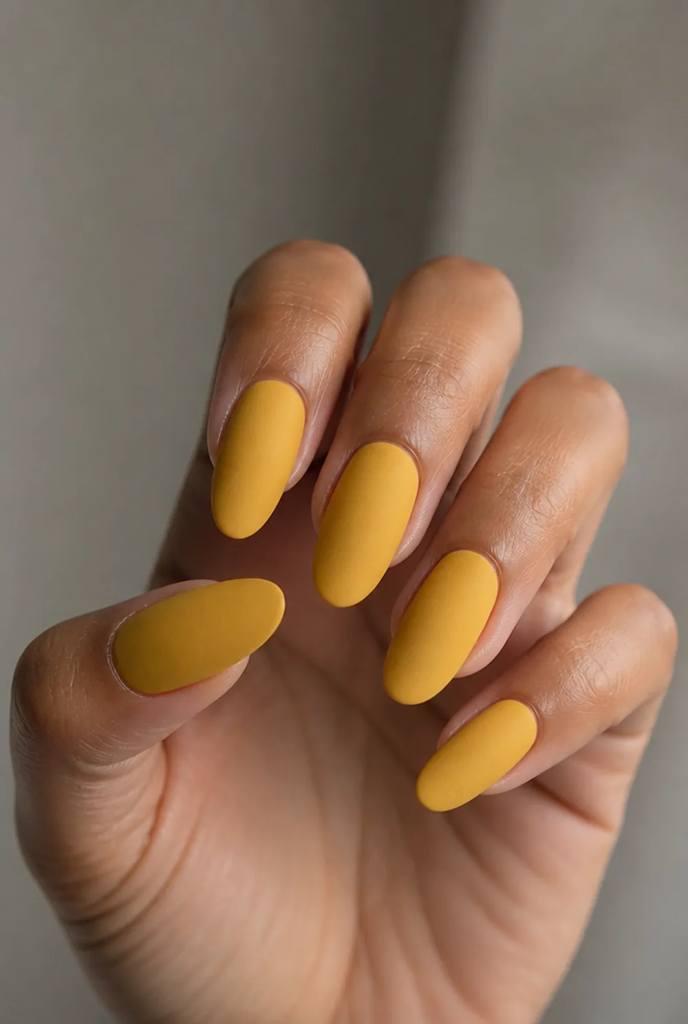 mustard matte nail art on olive skin, long length