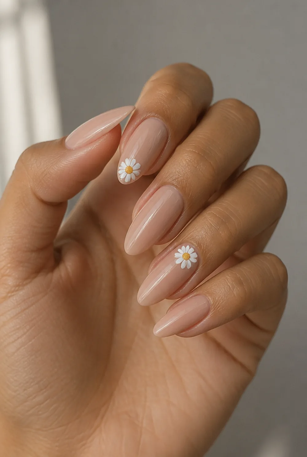 yellow and white daisy nail art on olive skin, long length