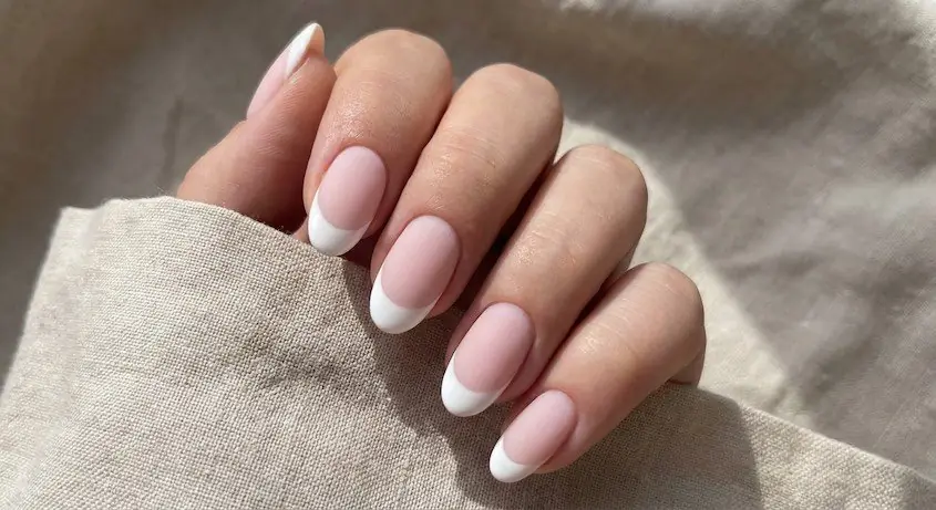 12wed - PolishedAndPrettyNails.com Matte bridal French manicure with soft white tips on short almond nails