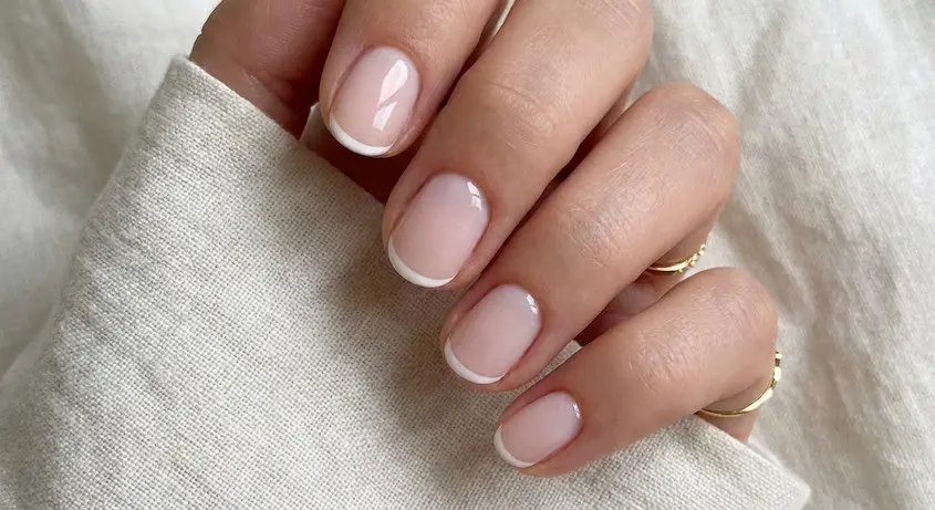 8wed - PolishedAndPrettyNails.com Minimalist micro French manicure with thin white tips on short rounded nails