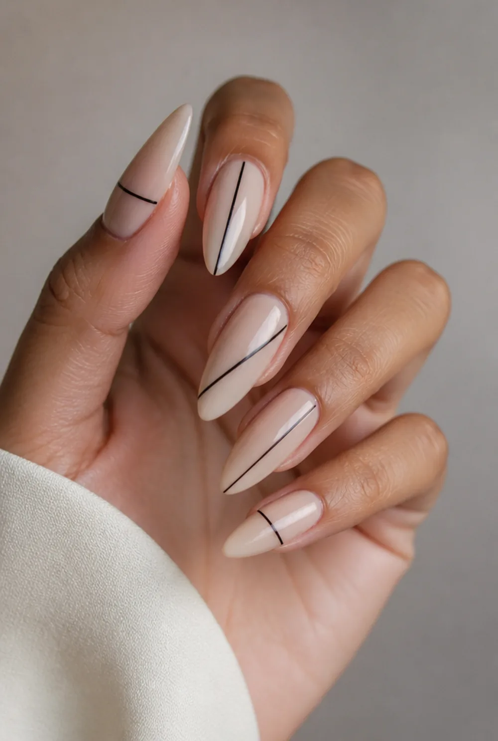 single black line nail art on olive skin, long length