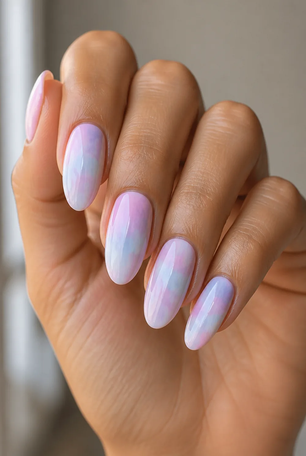 blurred colour wash nail art on olive skin, long length