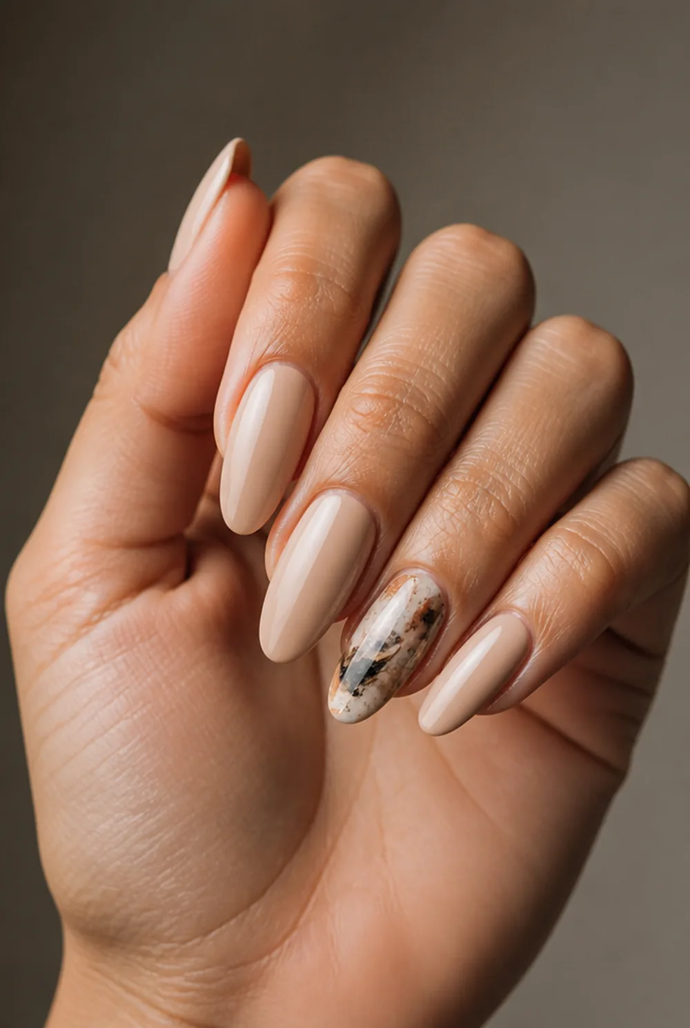 one accent nail nail art on olive skin, long length