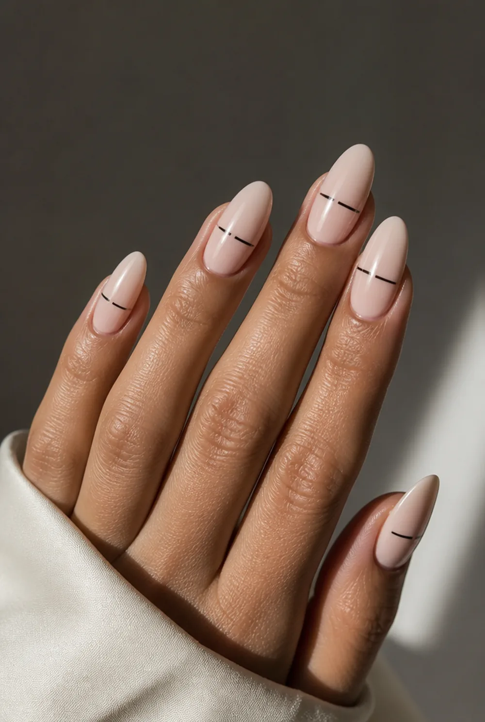 broken line nail art on olive skin, long length