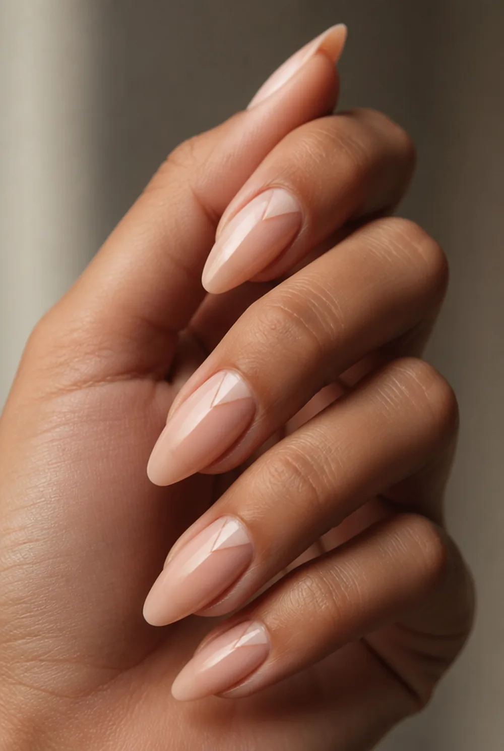 negative space triangle nail art on olive skin, long length