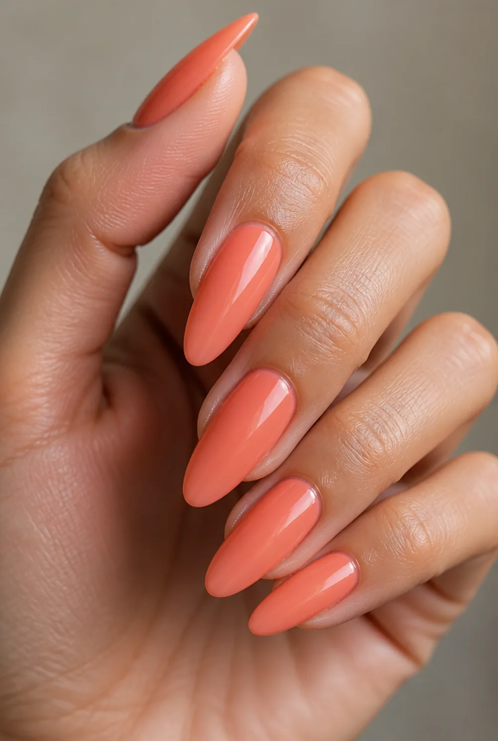 sheer coral jelly nail art on olive skin, long length
