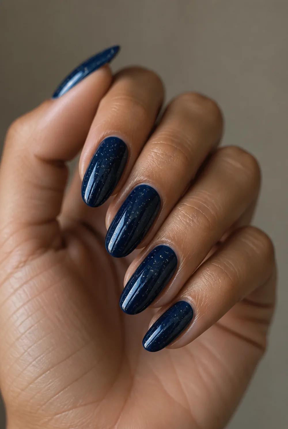 encapsulated star flakes nail art on olive skin, long length