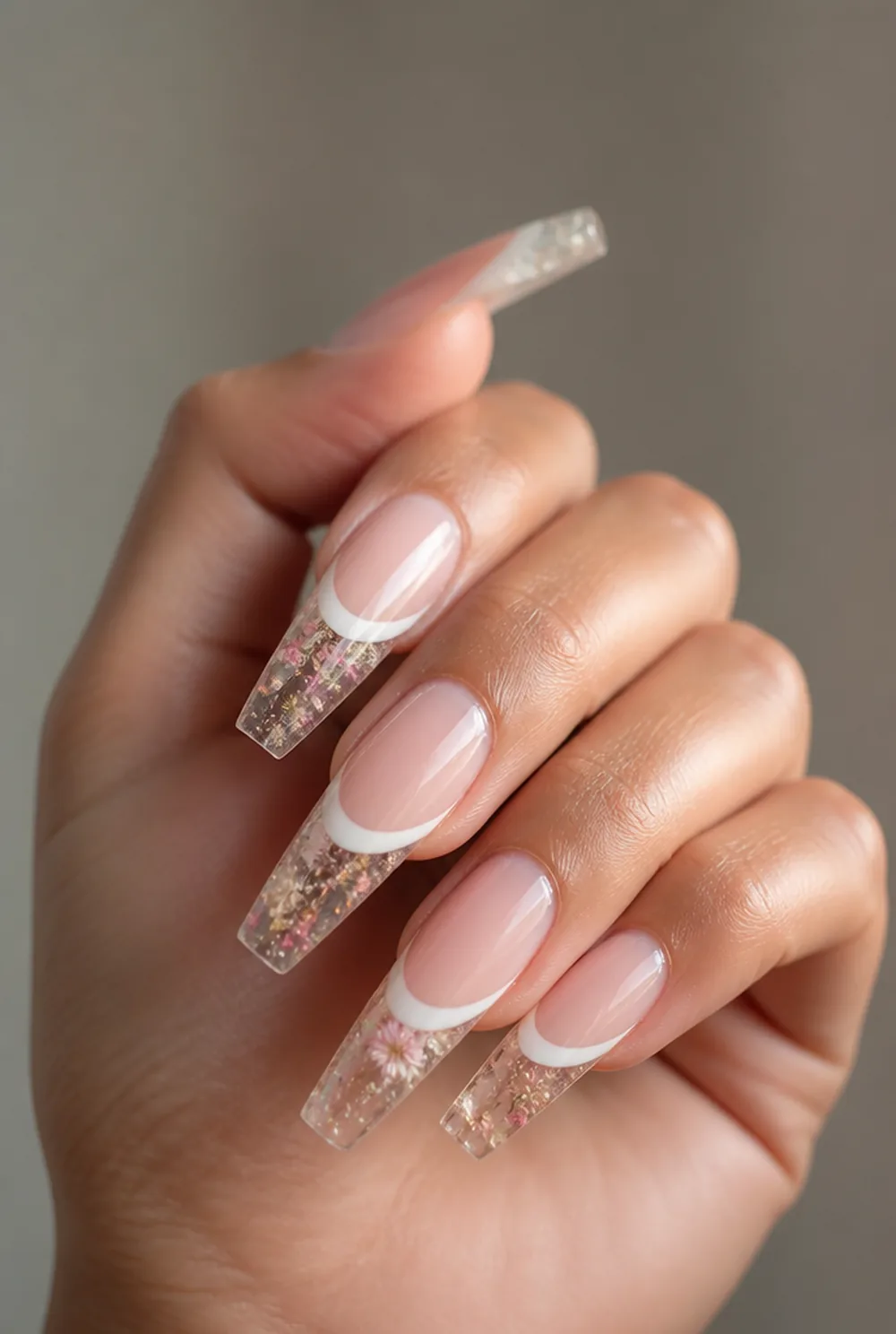 encapsulated french nail art on olive skin, long length