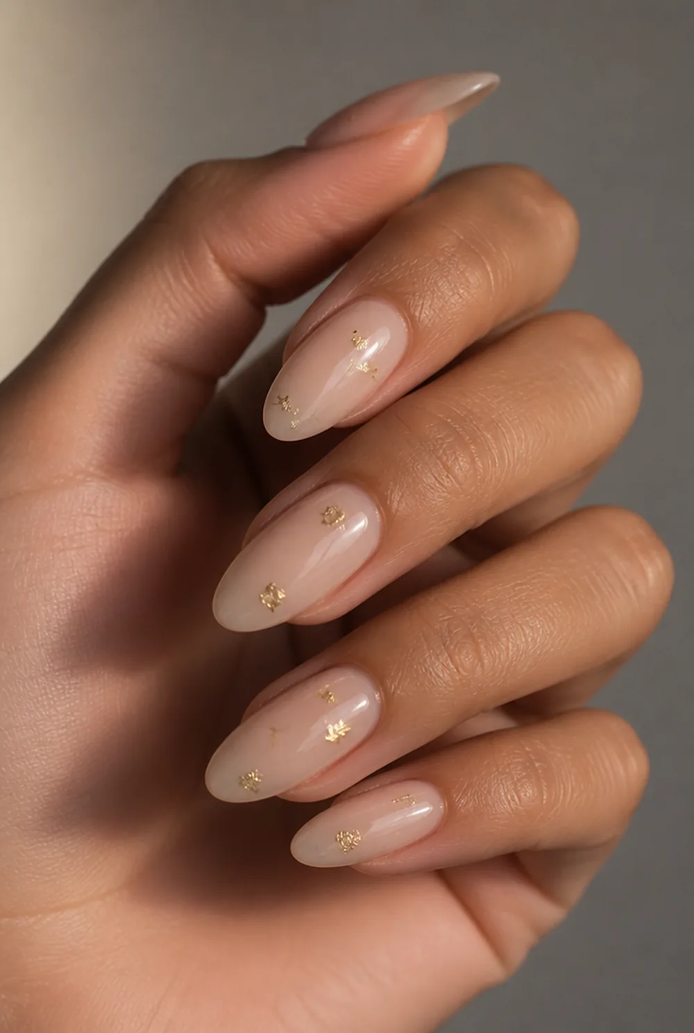 micro foil flecks nail art on olive skin, long length