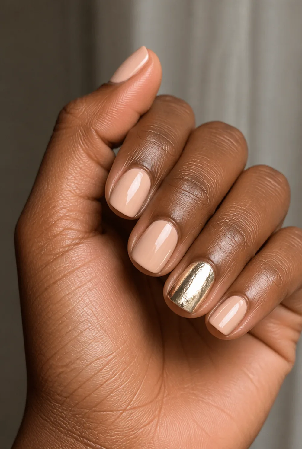 foil accent nail nail art on deep brown skin