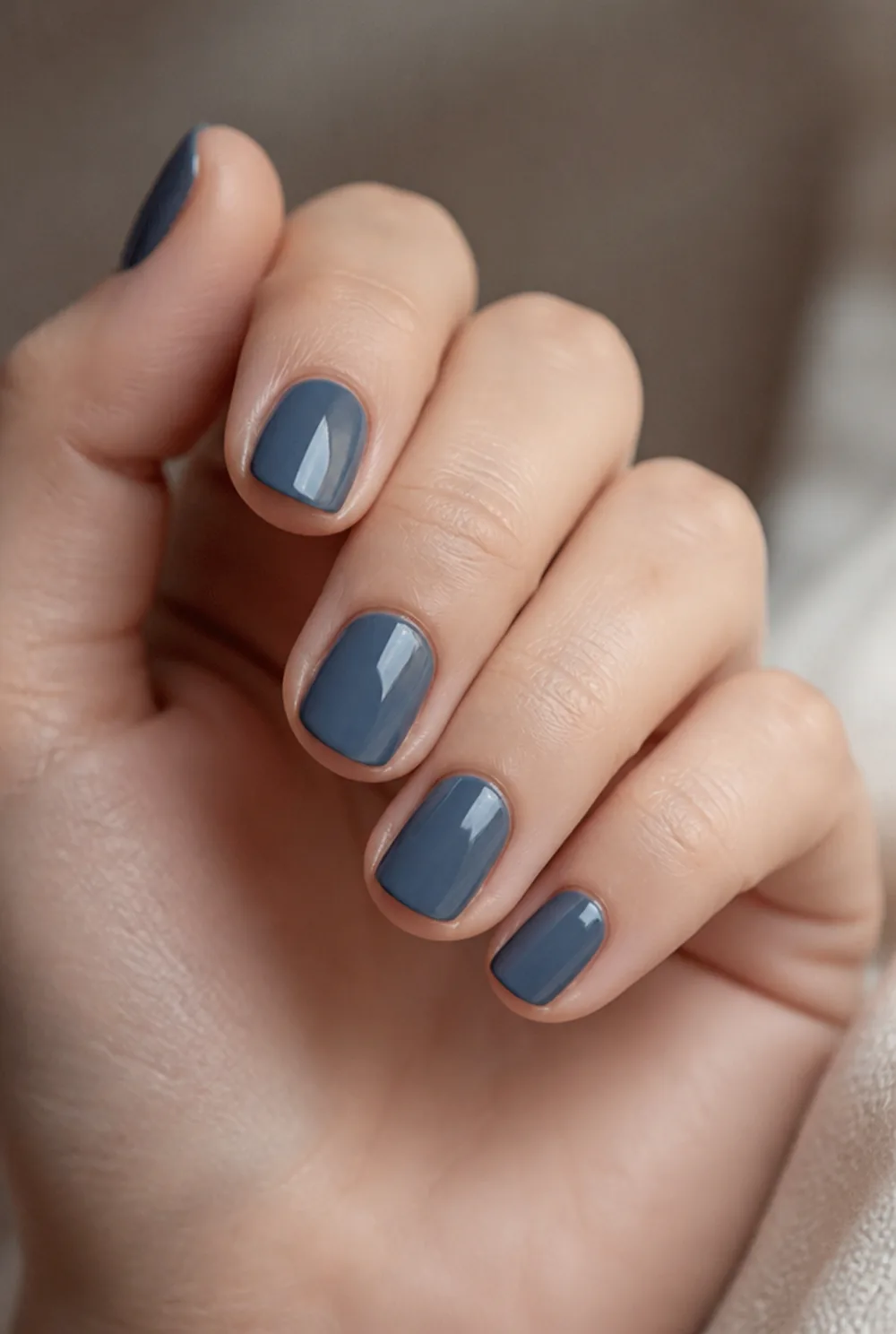 slate blue grey nail art on fair skin, short length