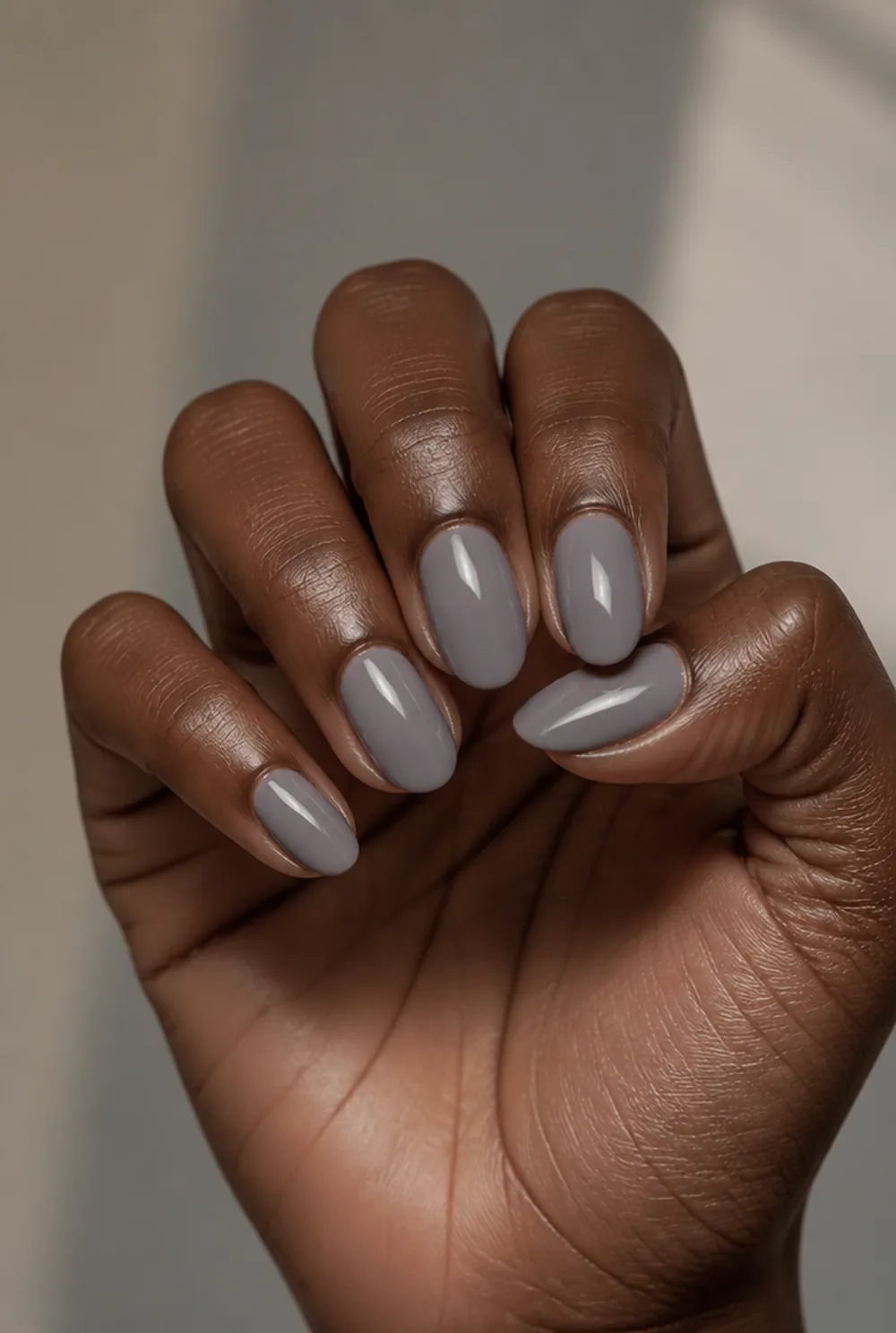 dove grey nail art on deep brown skin