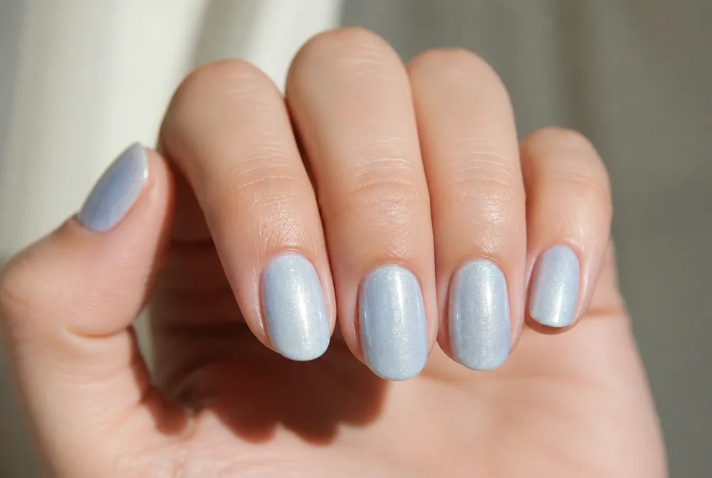 ice blue shimmer nails with silver sparkle