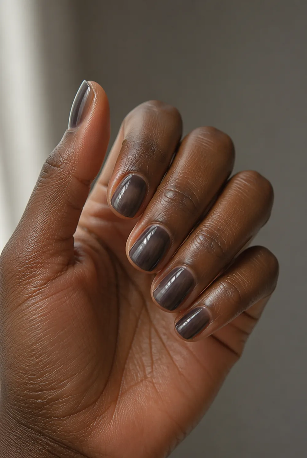 jelly black nail art on deep brown skin